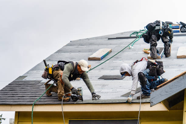 Professional Gutter Installation technician working in Kelso, WA